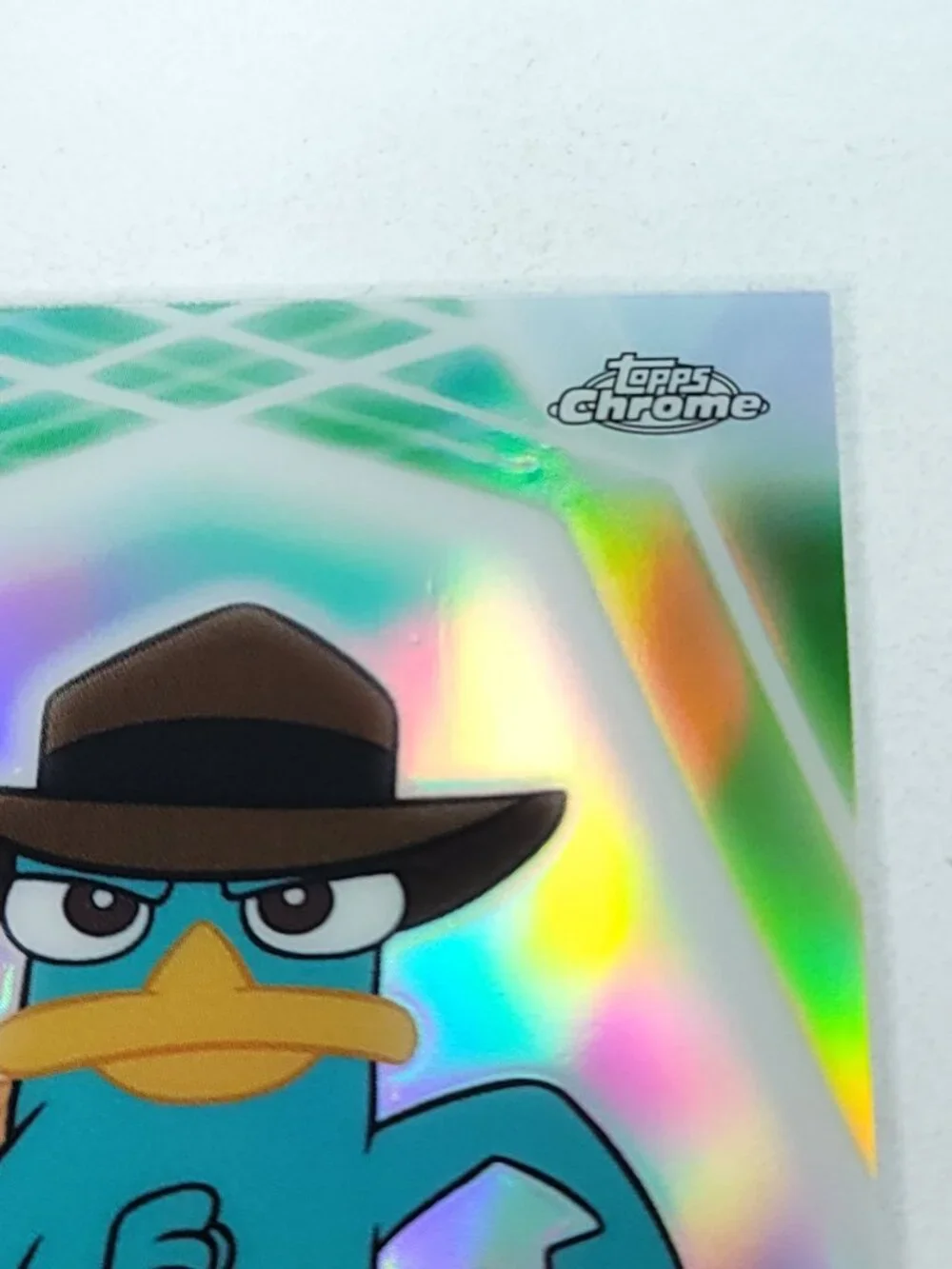 Perry Platypus Topps 2026 Disney Neon Holo Chrome Refractor Limited 156/199 CNE